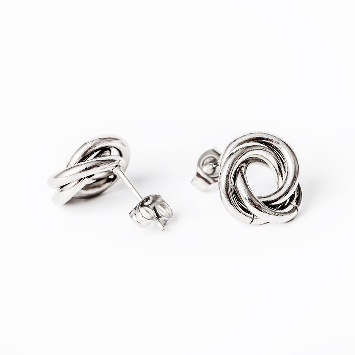 Carmen Silver Earrings standing in the center of the image against a white background. 