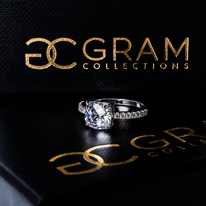 The Cassia Ring standing on its uniquely designed box. 