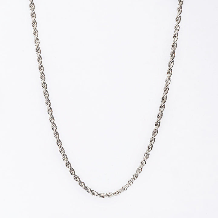 aCatania necklace standing in the center of the image 