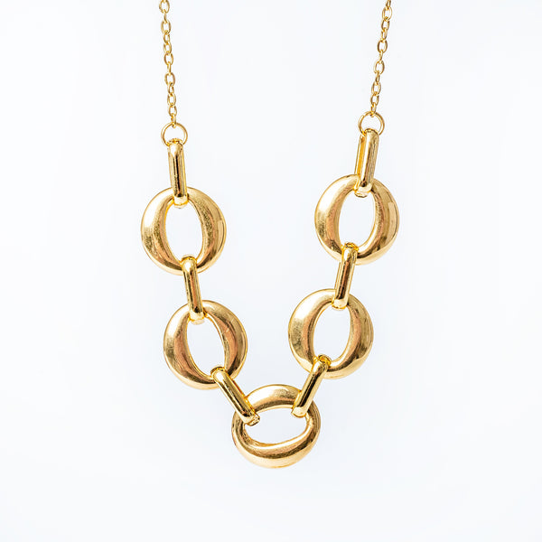 A gold-plated stainless steel necklace with a chain design and yellow gold color.