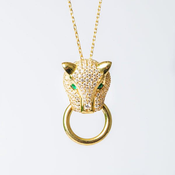 Chleo necklace with a yellow gold finish, featuring a fox-shaped pendant adorned with cubic zirconia stones.