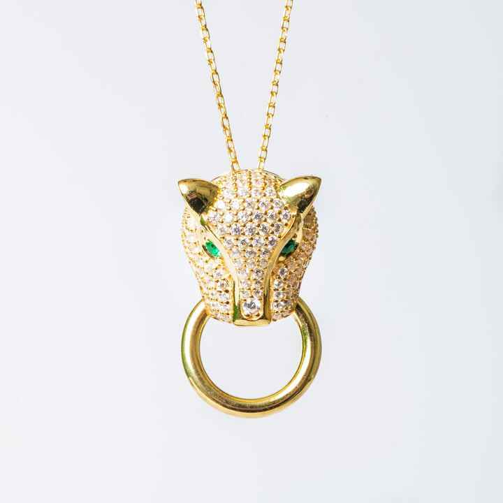 Chleo necklace with a yellow gold finish, featuring a fox-shaped pendant adorned with cubic zirconia stones.