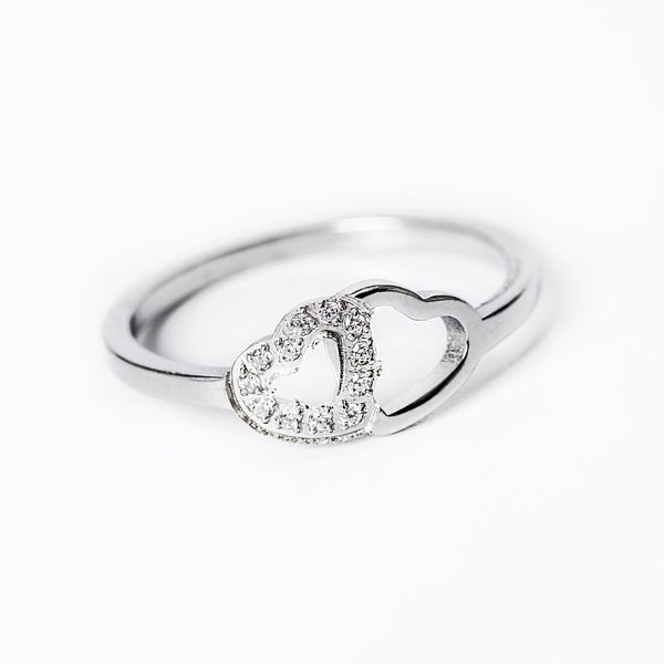 A close up view of Chloe Silver Ring standing in the center of the image against a white background. 