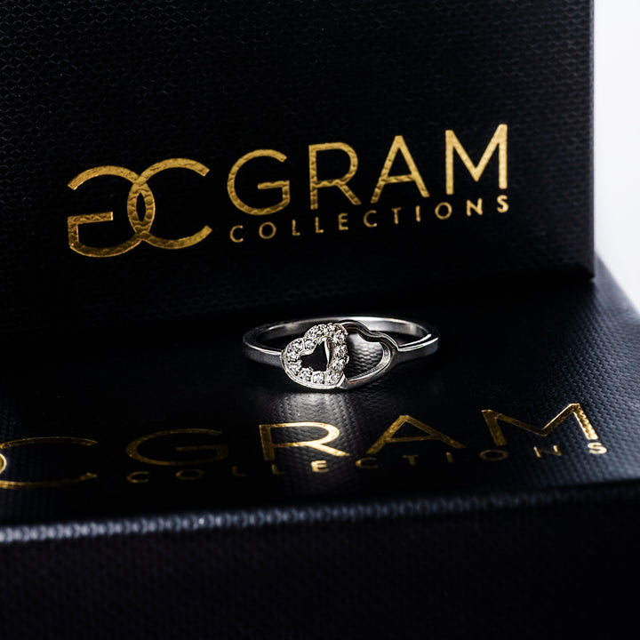 A close up view of Chloe Silver Ring placed on its box. 