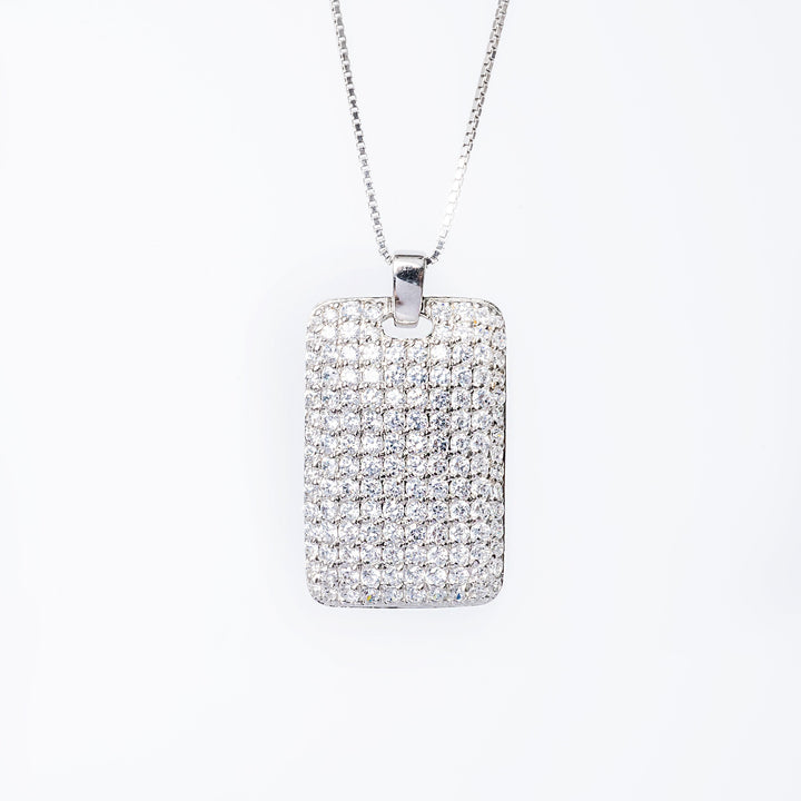 A sterling silver Clementis necklace with a pendant featuring cubic zirconia, attached to a chain.