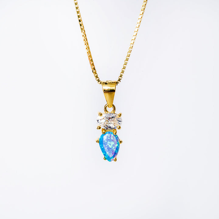 A close up view of clement pendant standing in the center of the image against a white background 