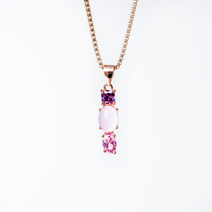A close up view of Cody set necklace standing in the center of the image against a white background. 