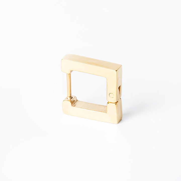 A Connor earring is displayed upright against a white background.