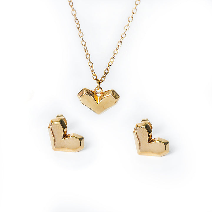 Danita set in gold with a heart shaped necklace and matching stud earrings