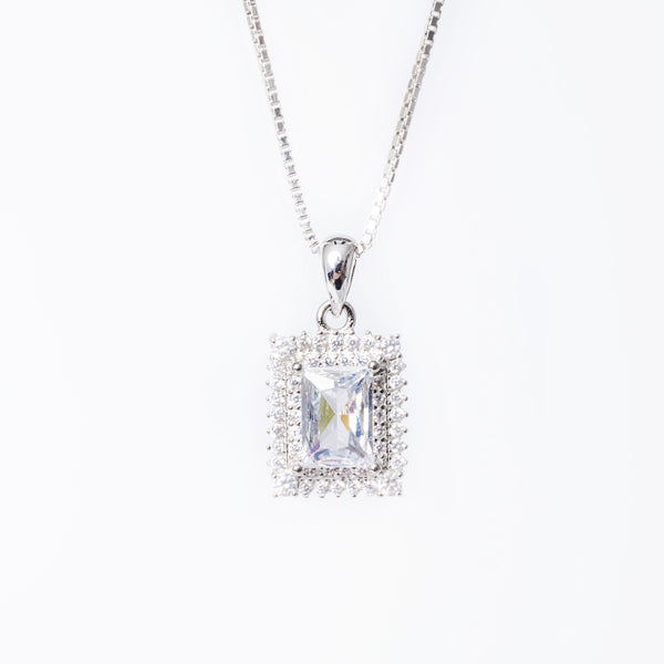 A close up view of Daphne necklace standing against a white background. 