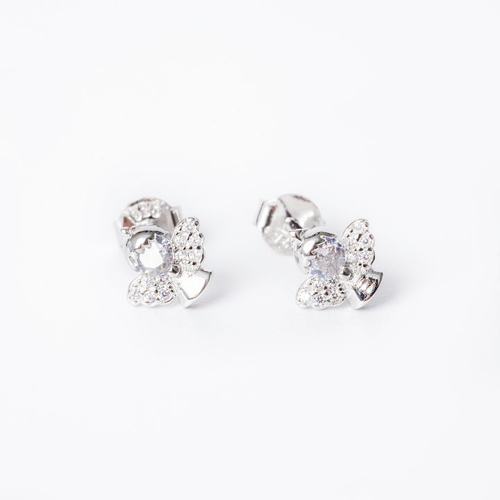 A close up view of dina earrings standing in the center of the image against a white background 