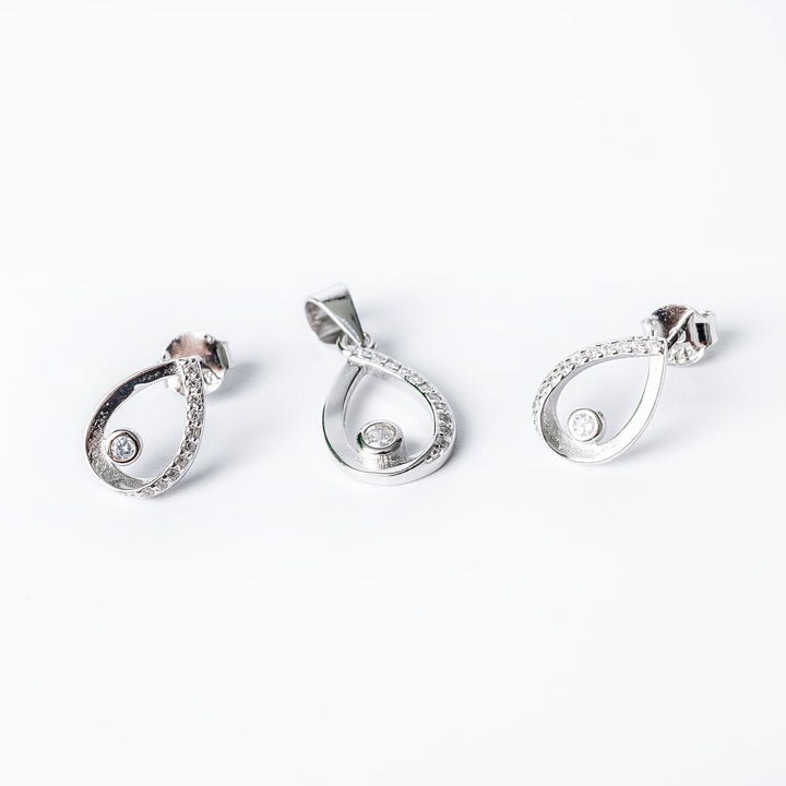 Emma earrings close up view standing in the center of the image against a white background. 