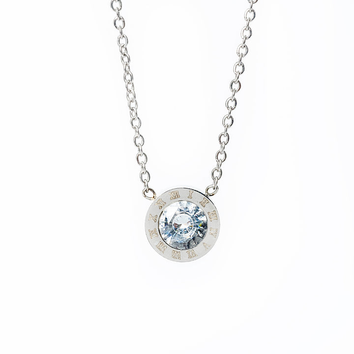 An Easter silver necklace with a gold plated stainless steel chain and a central cubic zirconia pendant.