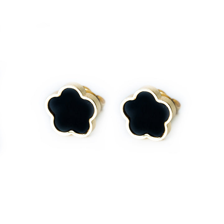 Gold Fiore stud earrings featuring black flower-shaped fronts on a white background