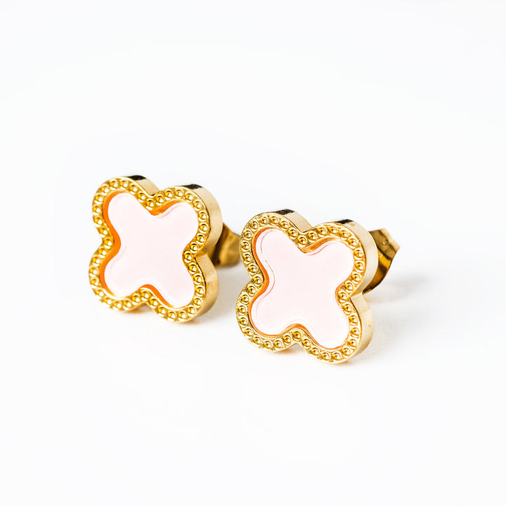 A close up view of Fiorella Earrings in pink colour 