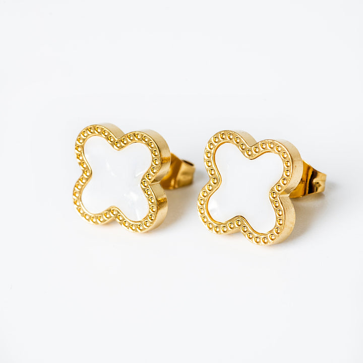 A close up view of Fiorella Earrings in white colour 