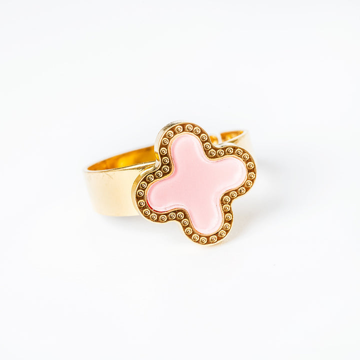 A close up view of Fiorella Ring standing in the center of the image against a white background. 