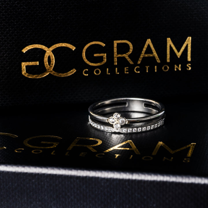 Fleur Silver Ring placed on its uniquely designed black gram collections box. 