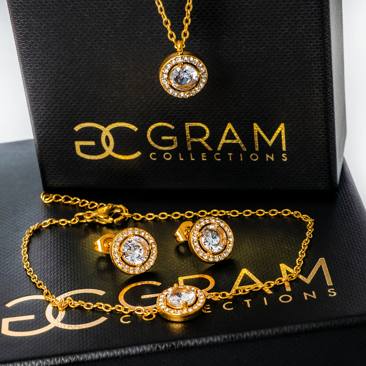 Gabby Gold Bracelet placed on its box standing in the center of the image. 