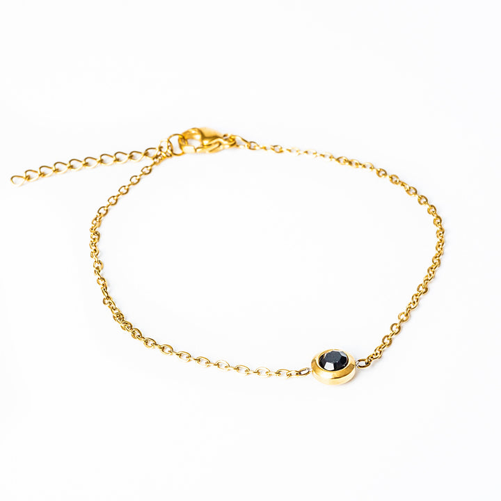 A close up view of Gabriella Gold Bracelet standing in the center of the image. 