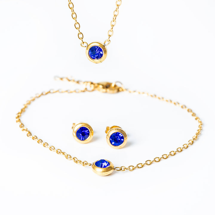 a close up view of Gabriella Gold set in blue colour stones. 