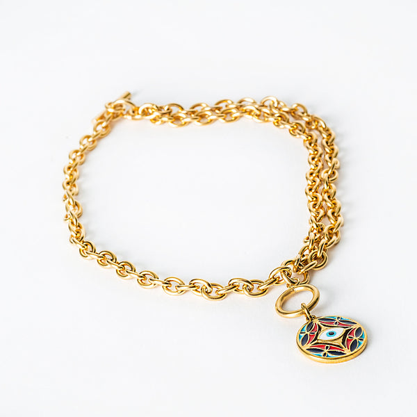 Gold  Ghajn chain bracelet with a colorful pendant on a white background