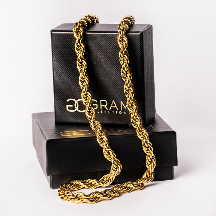 Bologna necklace chain attached to ints black box, white standing in the center of the image against a white background. 