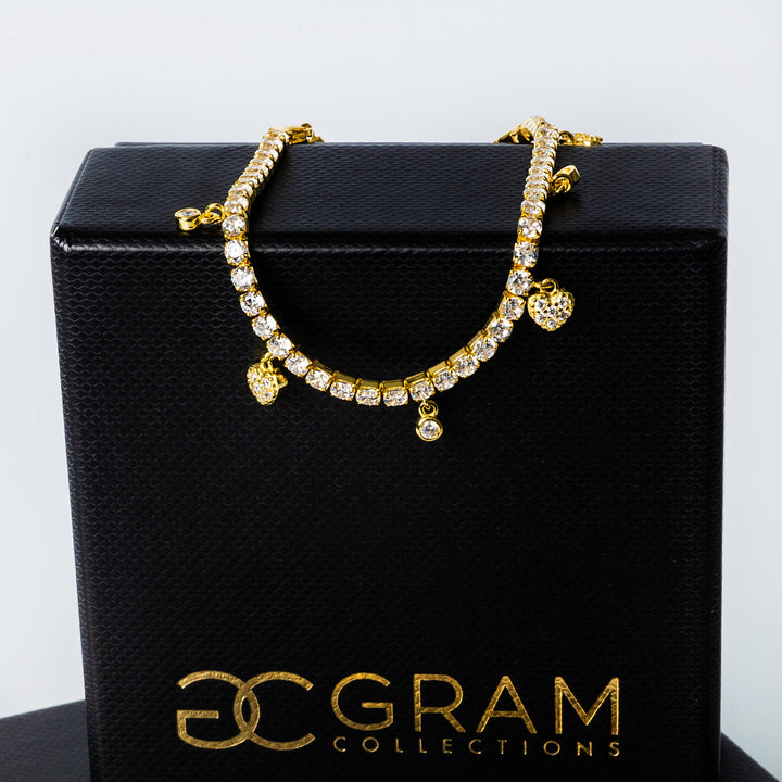 Gulia Necklace attached to the top of its box. 