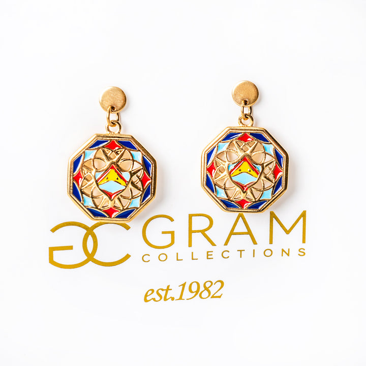 Luzzu Earrings standing in the center of the image 