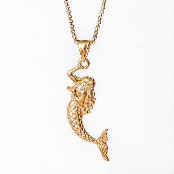 A gold-colored stainless steel Sirena necklace featuring a pendant in the shape of a mermaid.