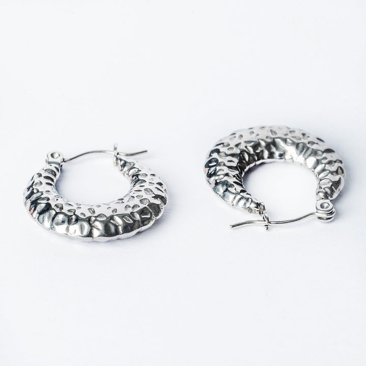 Graziella Silver Earrings standing in the center of the image against a white background. 