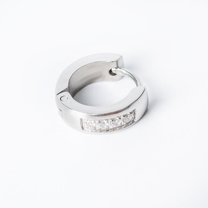 Jacob Silver Earrings standing in the center of the image against a white background. 