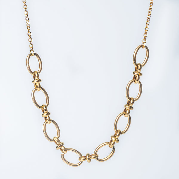 Janice gold necklace with linked oval rings and a chain