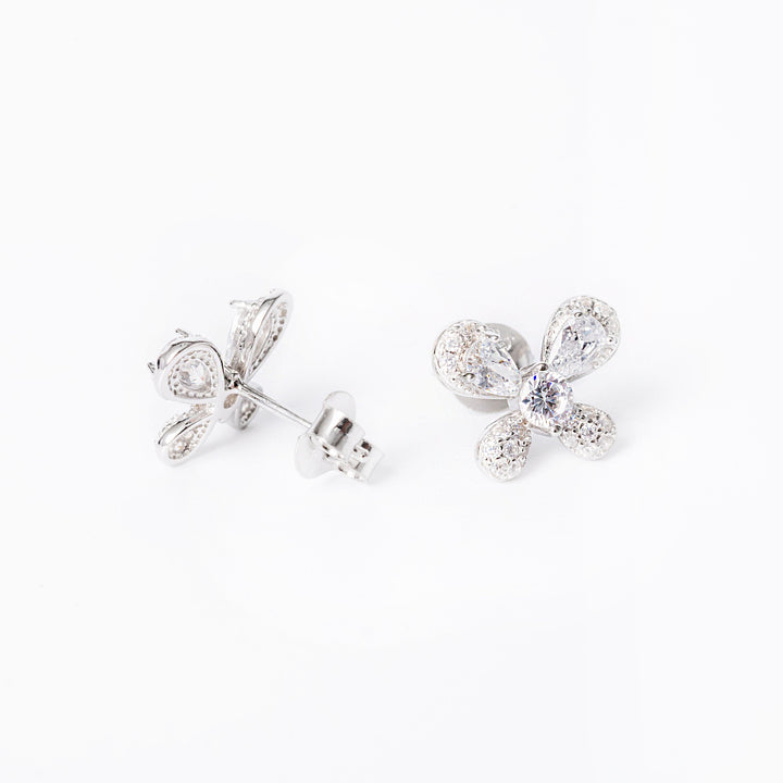 Jessie Earrings from profile and rare view standing against a white background. 