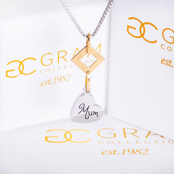 Judith Necklace standing in the center of the image surrounded by its boxes. 
