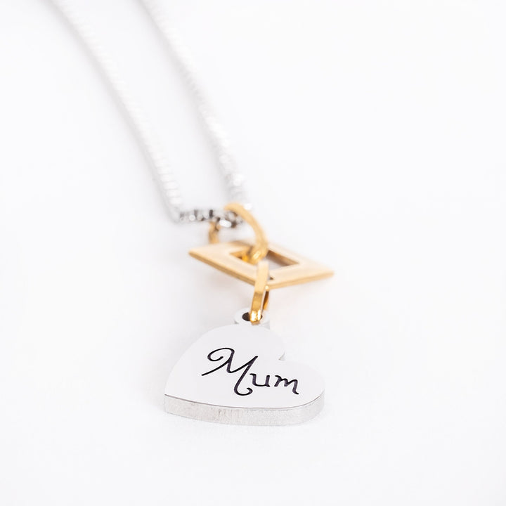 A close up view of judith necklace standing in the center of the image against a white background. 