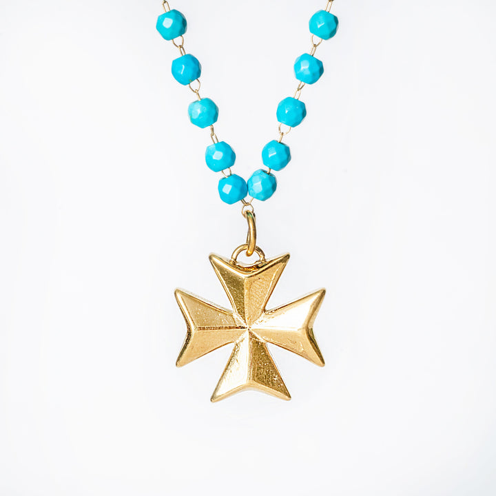 Frontal view of Khali necklace standing in the center of the image against a white background. 