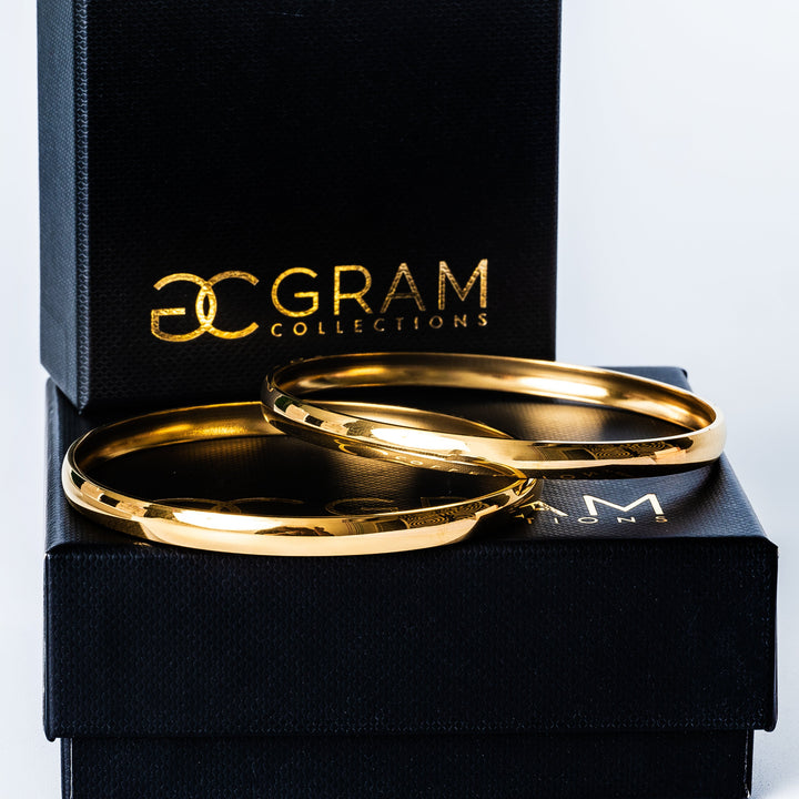 Two Kolina Filli Bangles on their box. 