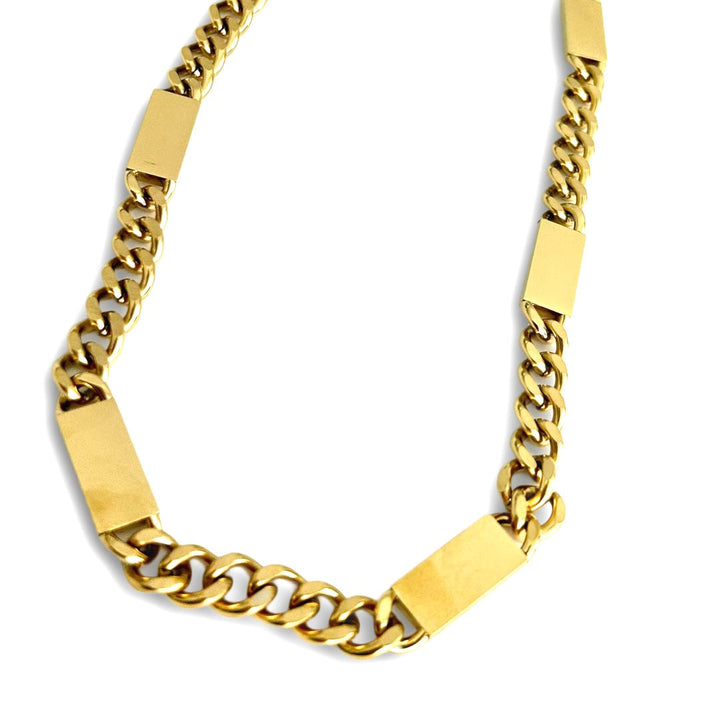 a side view of Large Bar Necklace (Maltese Style) standing in the center of the image against a white background. 
