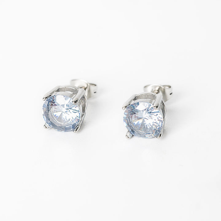 Silver Leia stud earrings with round clear gemstones in a prong setting.