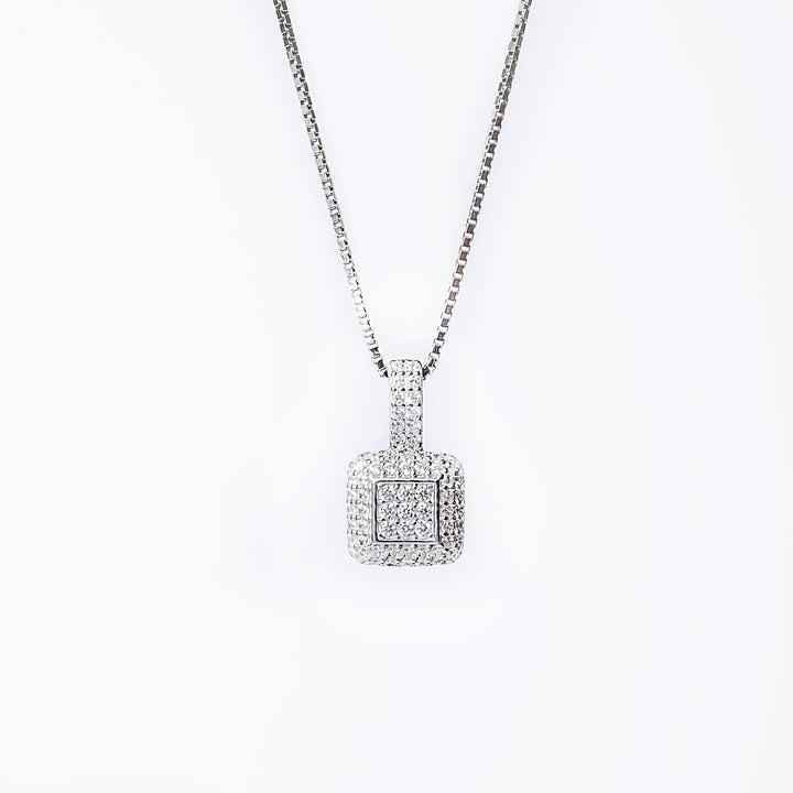 A sterling silver Liana necklace with a square-shaped pendant adorned with cubic zirconia, displayed against a white background.