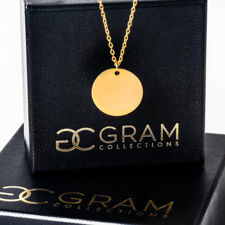 Lila Necklace attached to its uniquely designed gram collections box. 