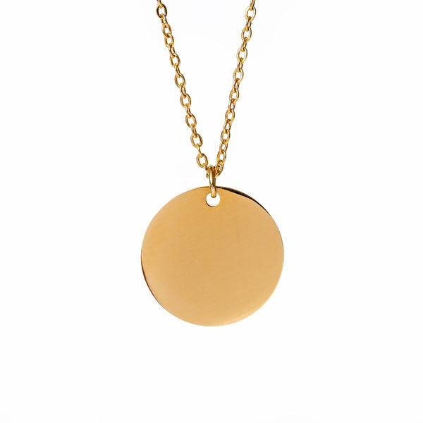 A Lila necklace gold-plated stainless steel necklace with a round pendant and a chain that has a gold-plated chain link and a metallic clasp.