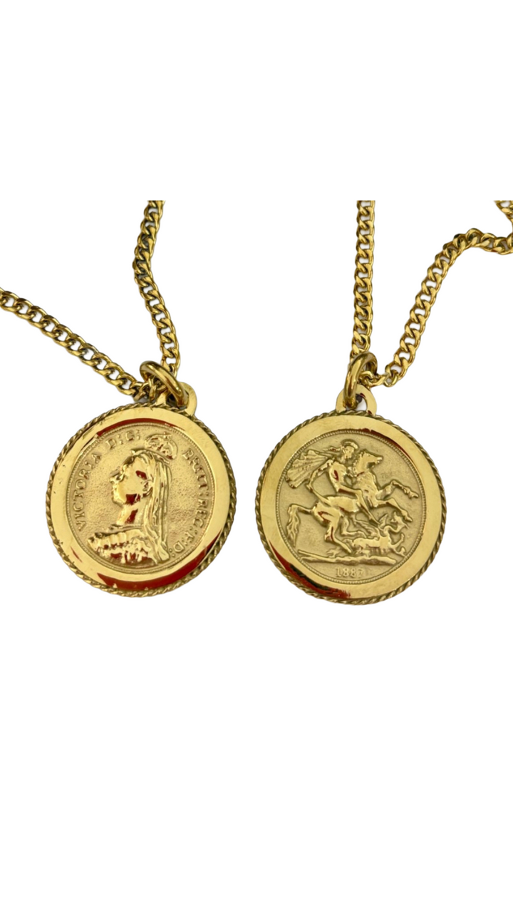 Two Lira Ta Deheb Pendants close up view 