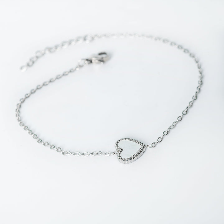Lisa silver bracelet with a small open heart pendant on a fine chain