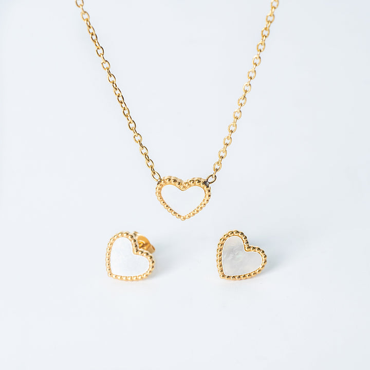 Lisa set in gold with an open heart necklace and matching stud earrings