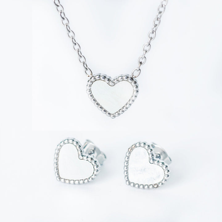 Lisa silver set with an open heart necklace and matching stud earrings