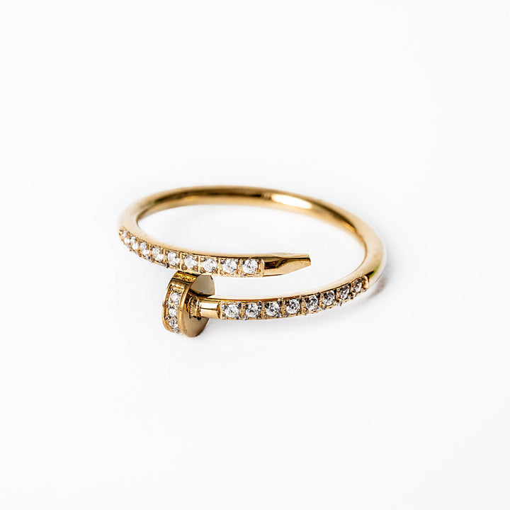 Lorna Gold Ring standing in the center of the image against a white background 