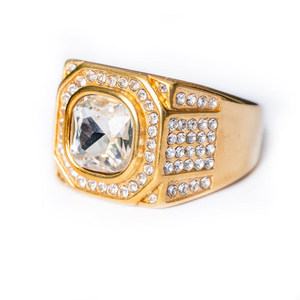 Gold Lorry Ring with a large square clear stone and pavé crystal detailing on the sides