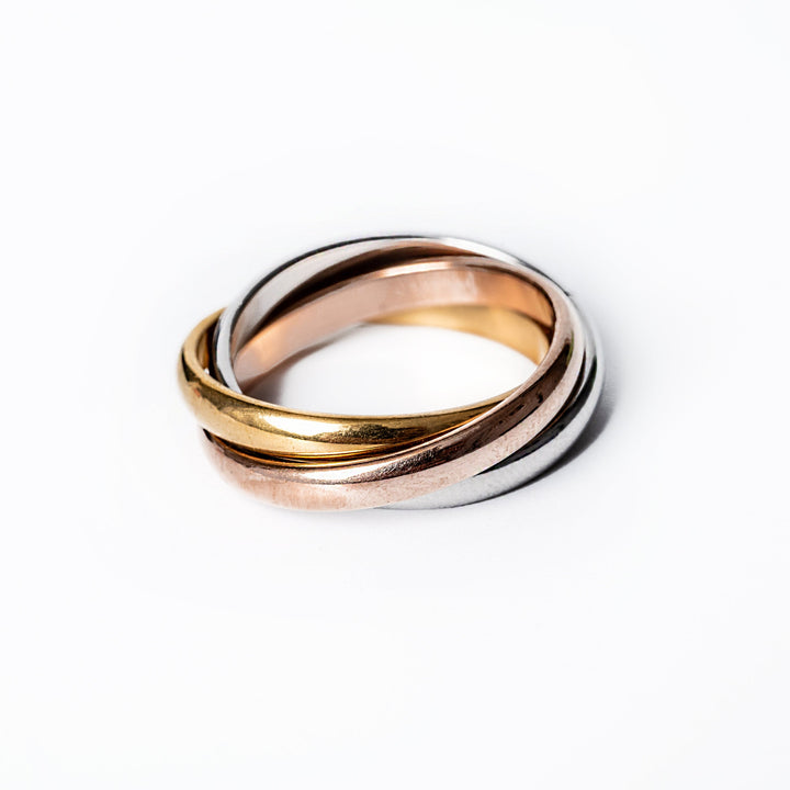 A close up view of Lourdes Ring standing in the center of the image against a white background 